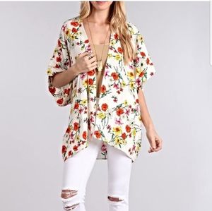 Chris and Carol white floral Kimono size Large